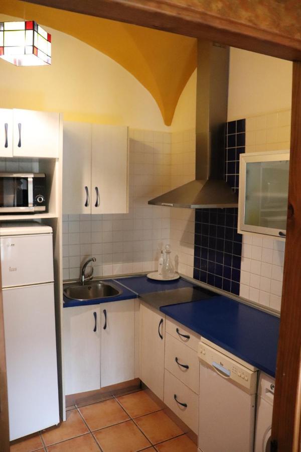 Apartamentos Las Buganvillas Caces Esterno foto